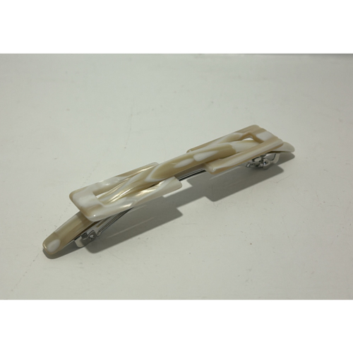 Barrette à cheveux en acétate de cellulose beige et blanc