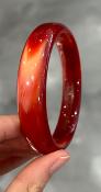 Bracelet jonc rouge orangé