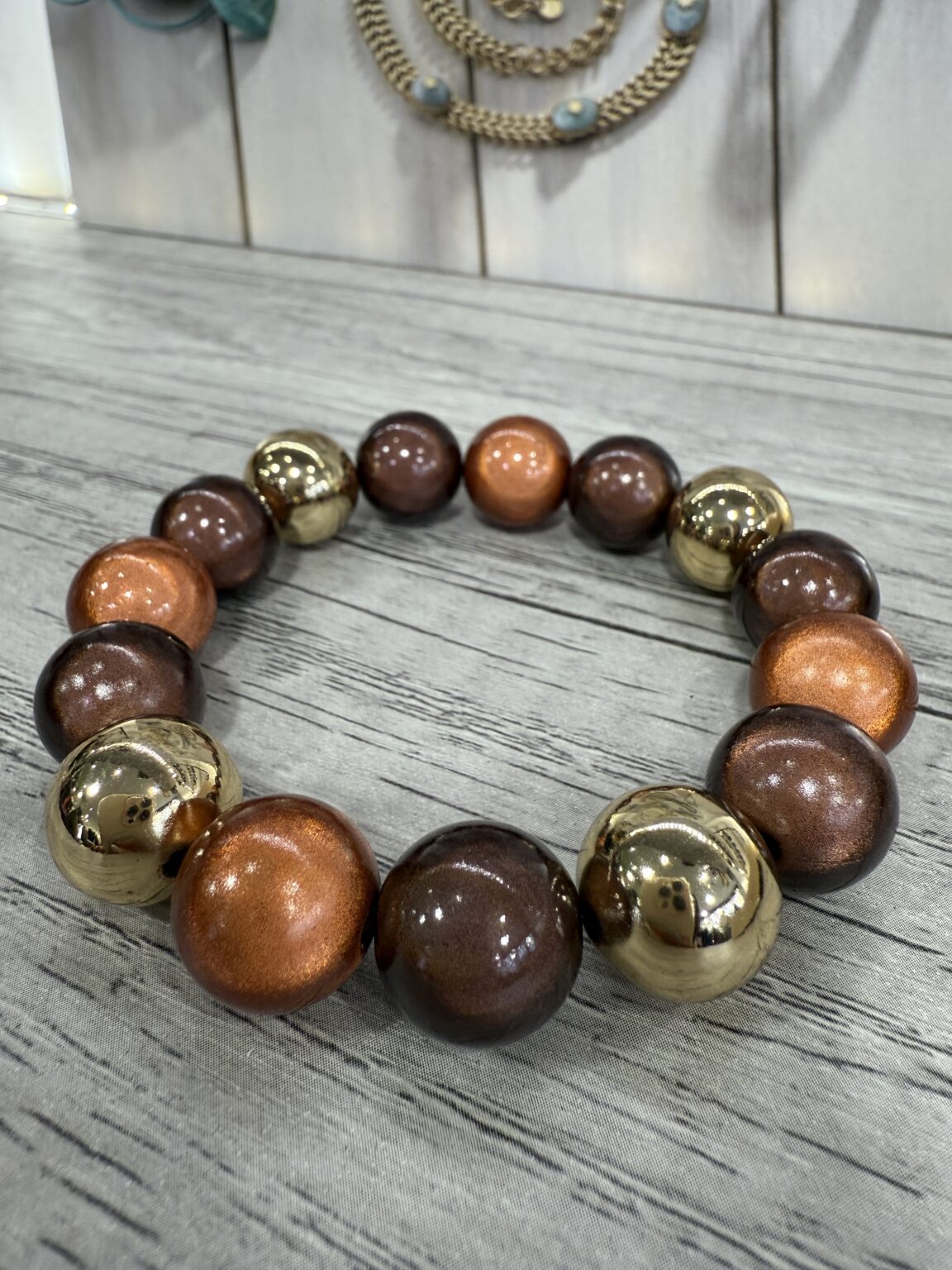 bracelet perles en résine marron orange doré