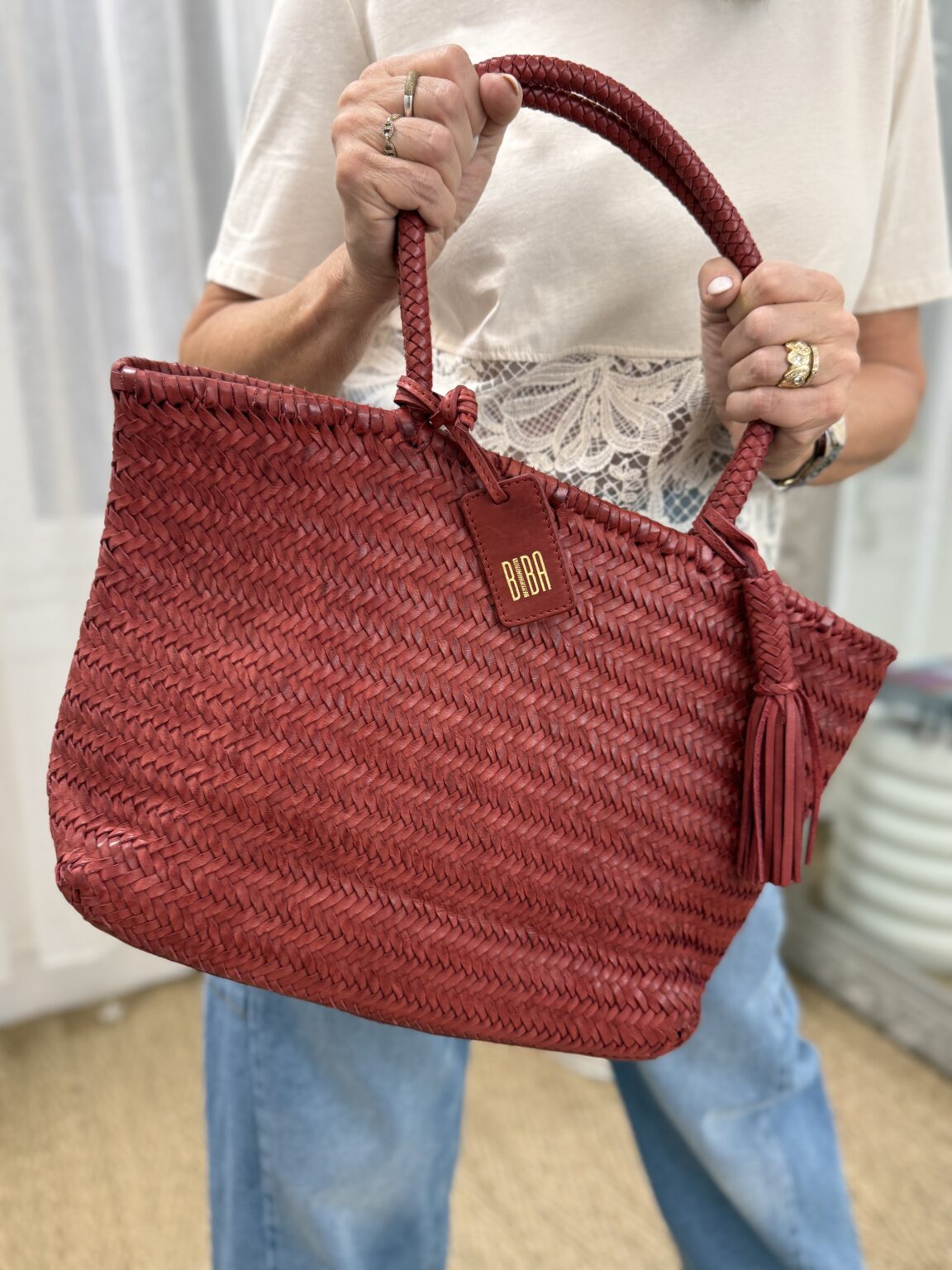 sac bandoulière en cuir tressé rouge perkins biba