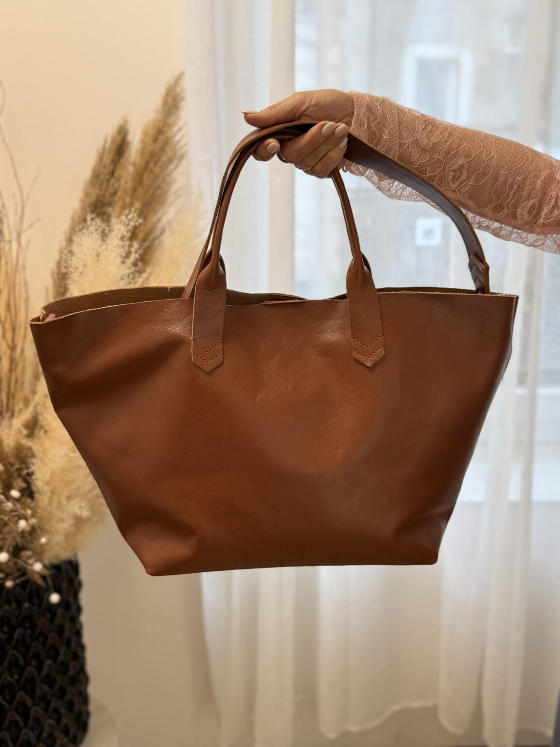 sac à main en cuir tressé tan beloit biba