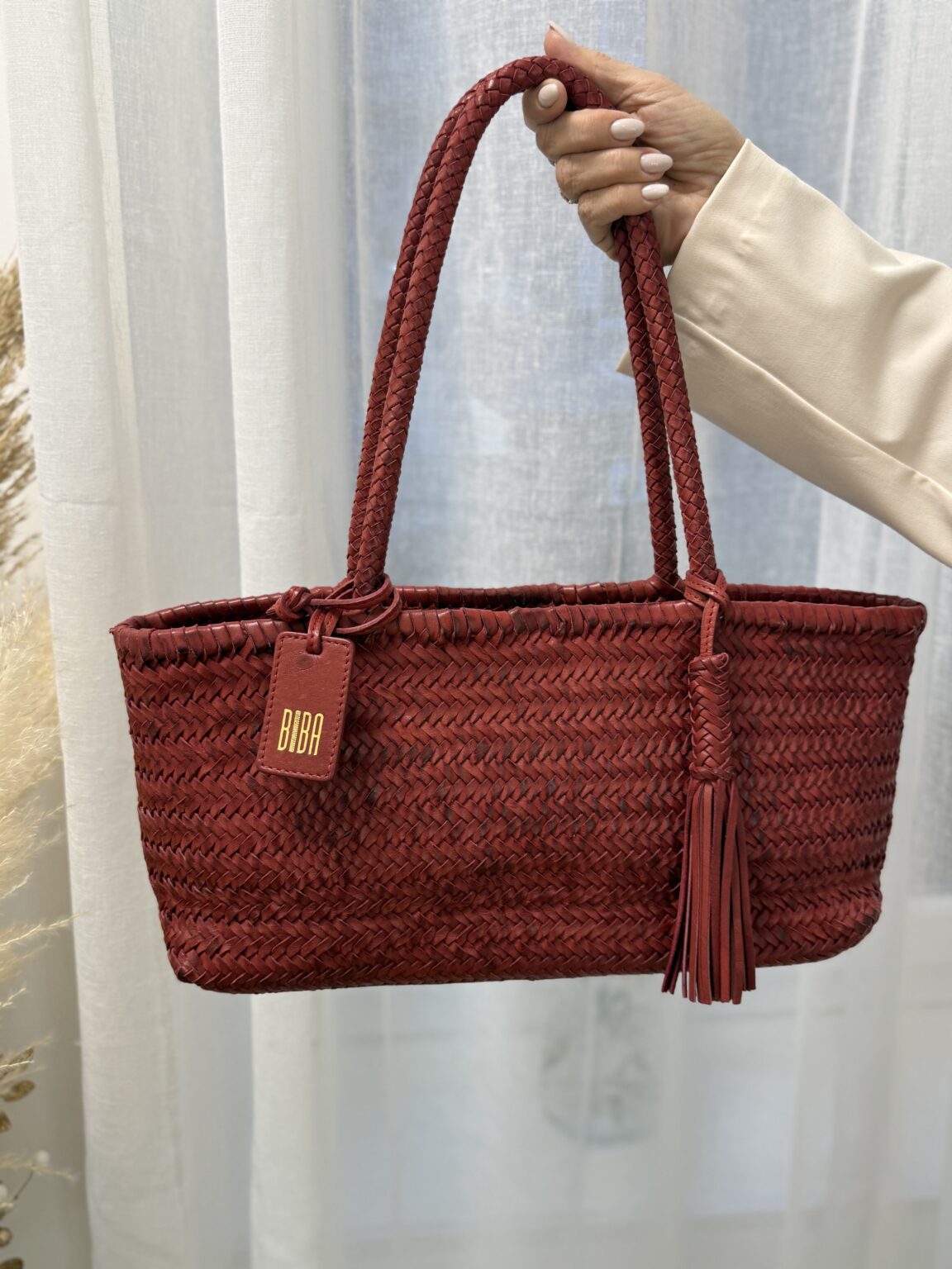 sac baguette en cuir tressé rouge perkins biba