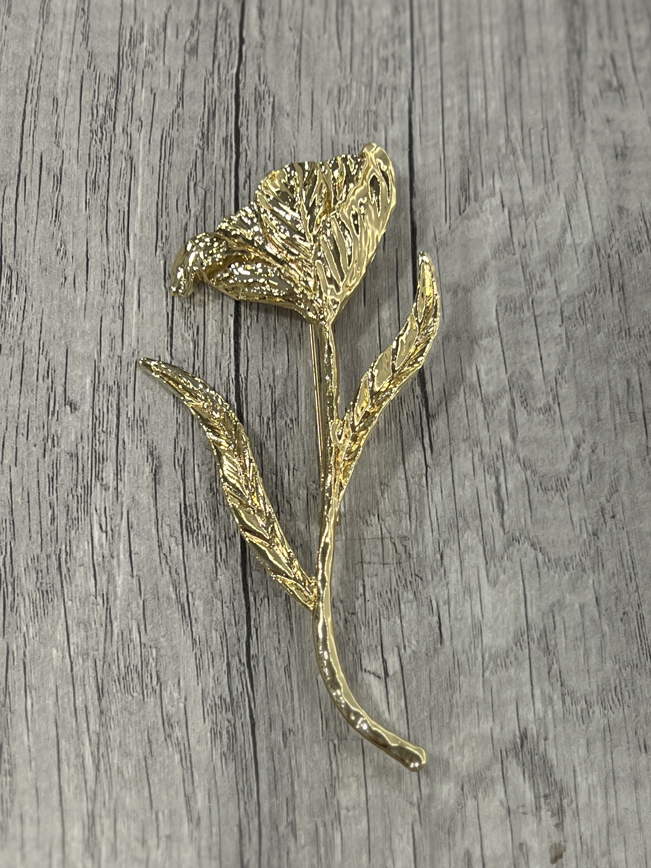 broche fleur dorée élégante dixie